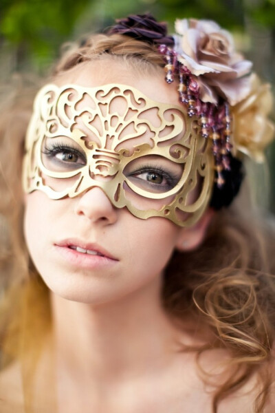 Masquerade mask in gold leather