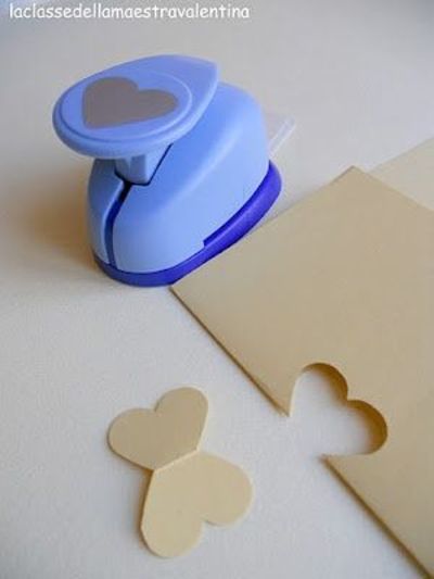 make a butterfly out of a heart paper punch!