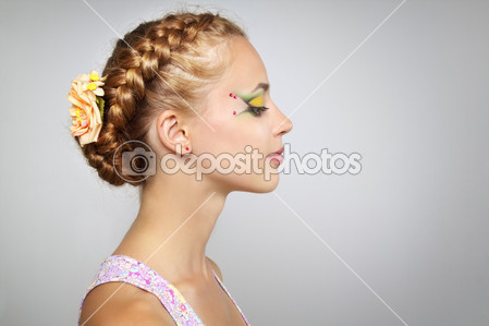 Woman with beautiful hairstyle and creative make-up by AnmFoto - 图库照片