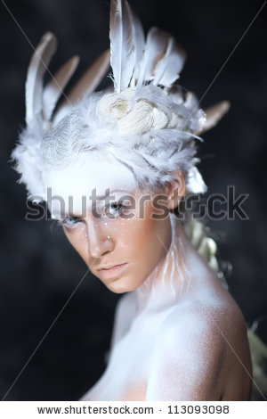 Young beautiful fashion model with creative makeup close-up portrait - stock photo