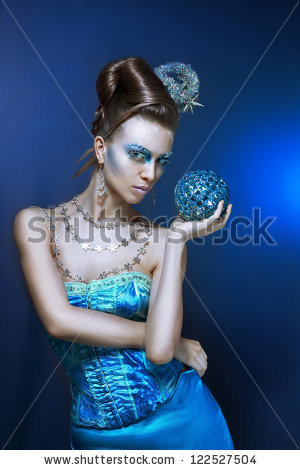 ce-queen. Young woman in creative image with silver artistic make-up. - stock photo