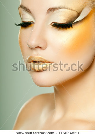 Portrait of beautiful woman model with professional makeup - stock photo