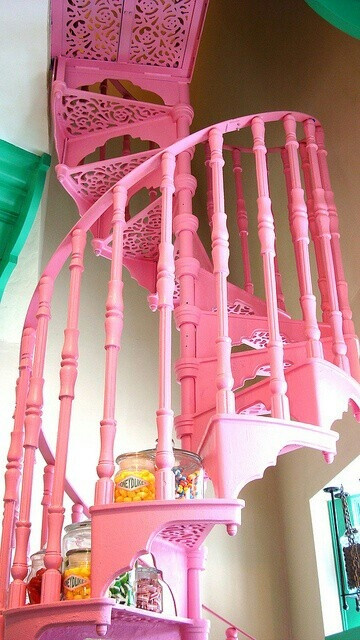 Pink spiral staircase ~ I would like one to go up through the back of the house to the second floor and then to the attic.