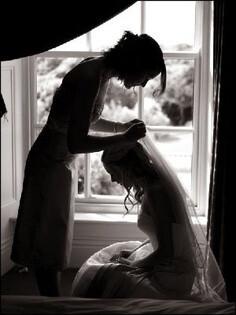 Mom and bride - a beautiful moment beautifully captured.