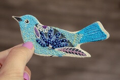 Lovely hand stitched blue bird pin by Geninne!