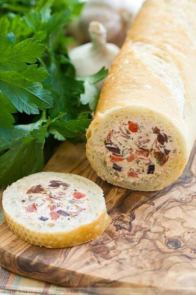 Stuffed baguette-goat and cream cheese, red pepper, Kalamata olives, etc...