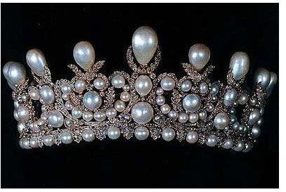 Empress Eugenie had this exquisite pearl tiara made for her for her wedding to Napoleon III. She had the jewelers take the napoléonique pearls which was originally made for Marie~Louise, to make her wedding jewels. Eugenie was a lover of Pearls and can be seen in the portrait below. The crown featur