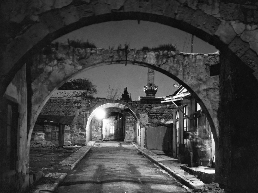 Arches frame a street in Limassol, Cyprus—also called Lemesos—in this photo from the 1920s. An ancient port city that's home to numerous archaeological sites, Limassol today is the Mediterranean island's wine capital and a popular beach destination.