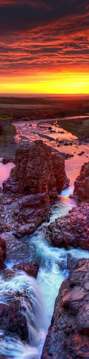 The waterfall cavern at sunset in Northern Iceland - photo from #treyratcliff Trey Ratcliff at www.StuckInCustoms.com - all images Creative Commons Noncommercial