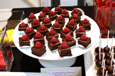 Honeyed Raspberry Brownies from Dessert Bar super fudgy brownies, topped with seedless raspberry preserves, raspberry ganache (spiked with Chambord) and topped with a honey filled raspberry...SO DANG …