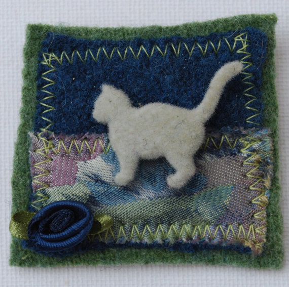 Cat brooch.