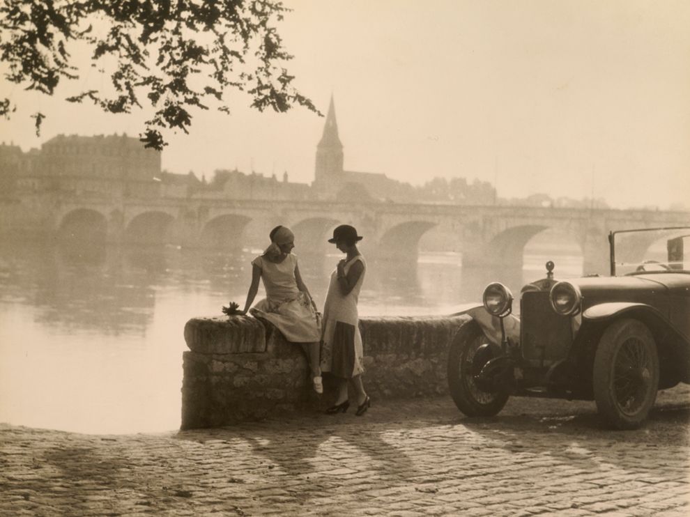 Photographer H. Armstrong Roberts captured this image of women sharing a conversation along the Loire River in Saumur, France, in 1928. Set in the Loire Valley, the city in western France is surrounded by vineyards and is home to several impressive chateaus.