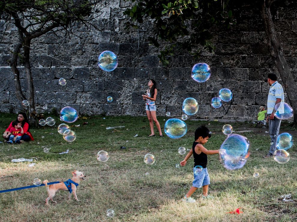  On Sundays during Mes de la Cometas, or Kite Month, the sky over Cartagena, Colombia, fills with colorful kites moving in every direction. "I knew this was a great opportunity for photography," says Your Shot contributor Massimo Rumi, who on arriving at a park found that the many colors, families,