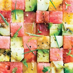 A summery salad of watermelon, avocado, tomato and cucumber. Tomato and Watermelon Salad Photo at Epicurious.com