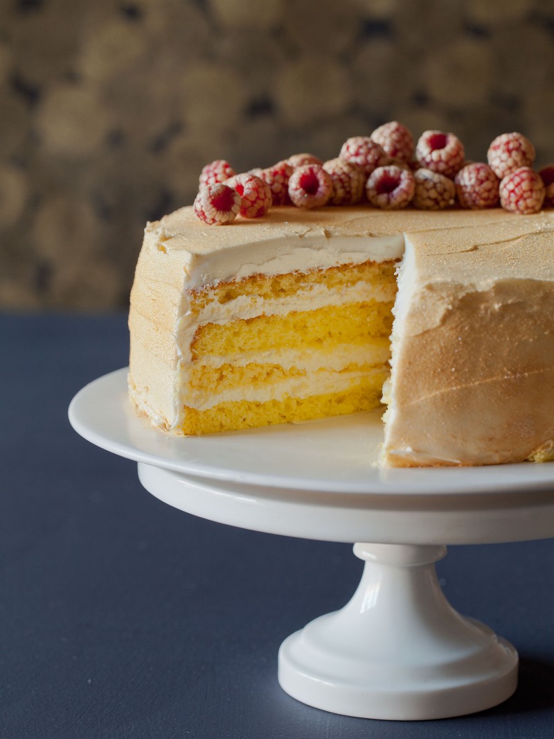 Rose Water Glitter Cake recipe with buttercream and glittered raspberries.