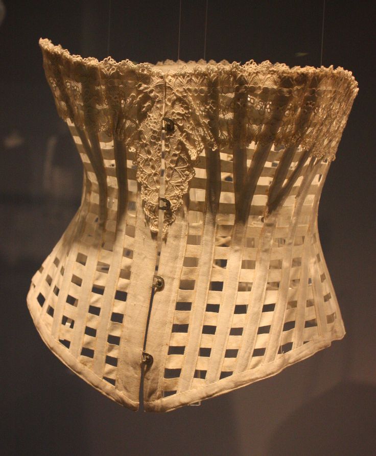 Corset - for summertime wear. It is basically vertical boning, and horizontal tapes. 1860's?