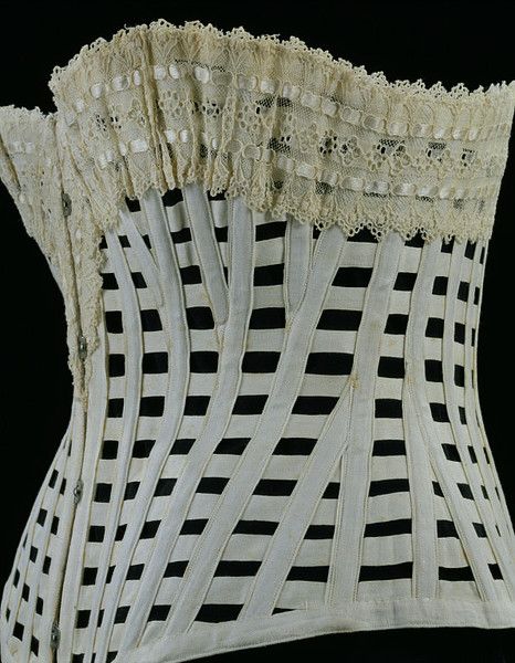 Corset (cotton and whalebone trimmed with broderie anglaise and silk ribbon, and steel centre back supports), Great Britain, 1890-1900 (made). http://pinterest.com/nikolaeftimov/la-corseterie/