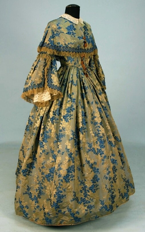 CHANGEABLE SILK BROCADE GOWN, c. 1855.