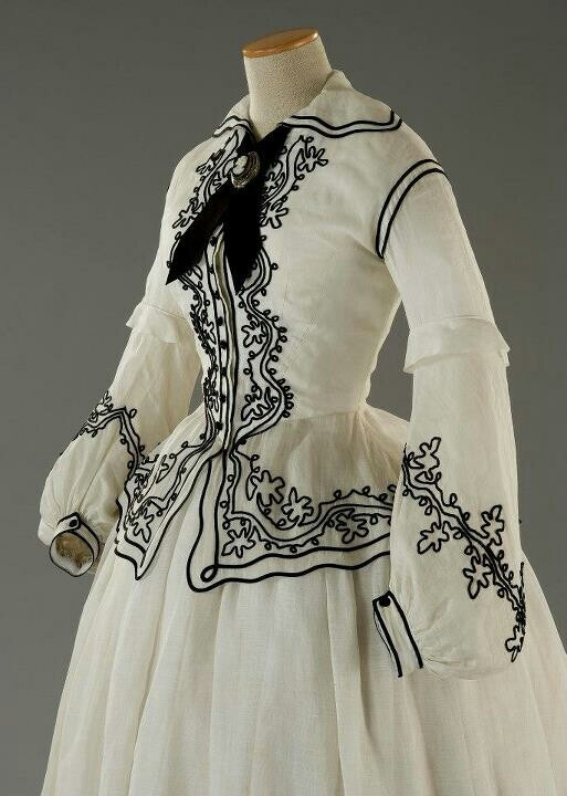 White with black detailing, I can't find the original source of this image but I'm guessing it's probably 1850s-1860s