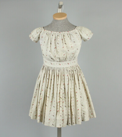 Dress, girl's, off-white printed cotton, purple and pink tulip patterning, c. 1864