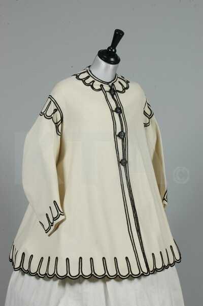 27-10-11 A good ivory wool flannel paletot, circa 1867, with black soutache trim, black moulded bois d'urcie cameo buttons