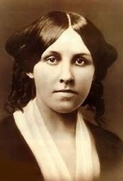 Louisa May Alcott. Check out those hair rats!