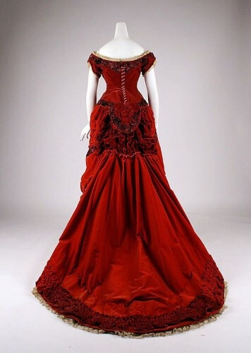 The back view of an incredibly beautiful dark ruby red dress circa 1875. #Victorian #1800s #fashion