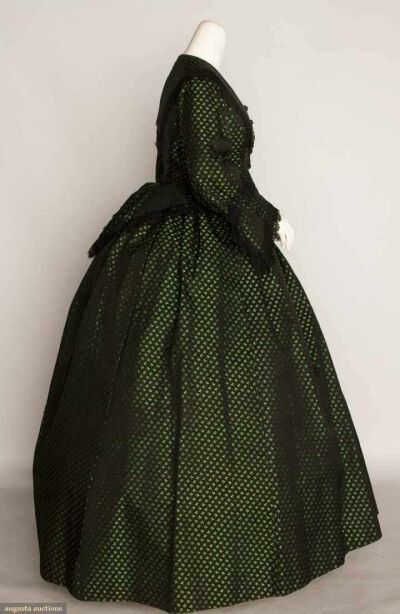 SILK BROCADE DAYDRESS, c. 1860 2 piece green &amp; black small sprigged brocade, peplum bodice, black lace trim, B 36", W 22.5", Skirt L 41"-45", excellent.