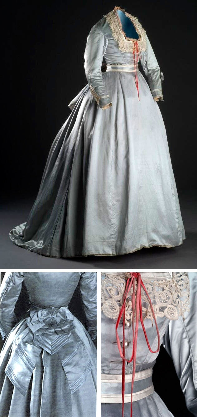 Silk satin dress, ca. 1865-70, in gray-blue. Boned bodice has square neckline trimmed with ivory silk satin ribbon, red silk velvet ribbon, and Valenciennes lace. Same trimming is repeated on sleeves. Closes in front with 4 pearl buttons. Bodice lined in cotton.