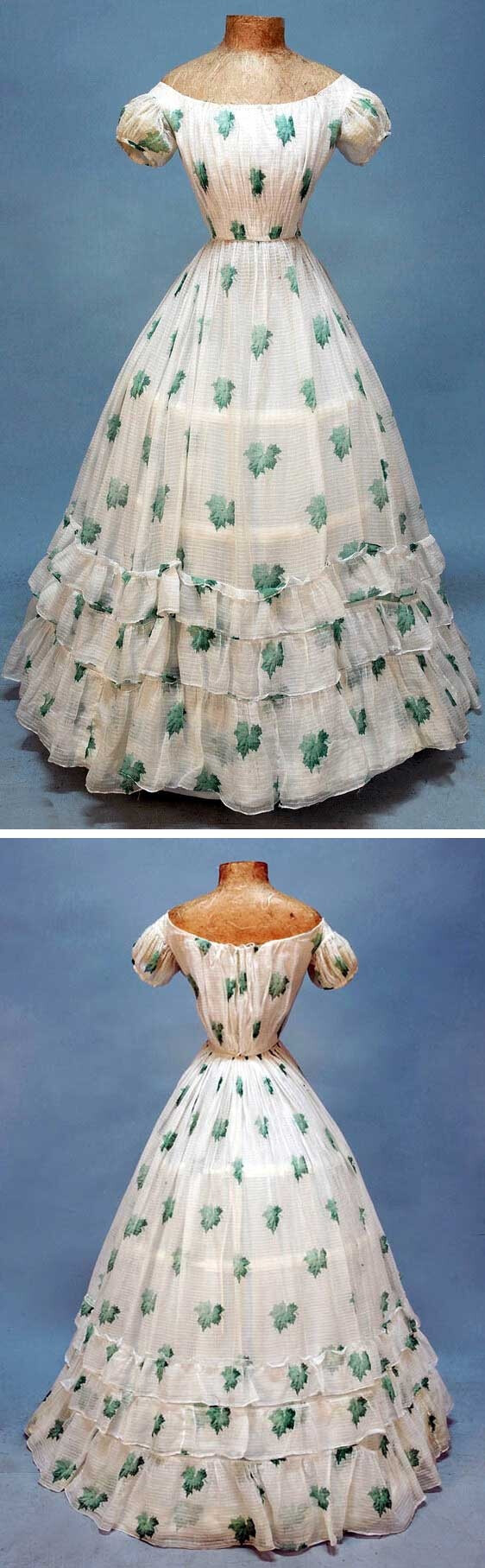 Young lady's summer party dress, 1860s. White cotton voile with horizontal pinstripe weave printed with shaded green oak leaves, having drawstring boatneck, short puffed sleeve and three graduated skirt ruffles, self piping, cotton bodice lining, back hooks &amp; eyes. Whitaker Auctions