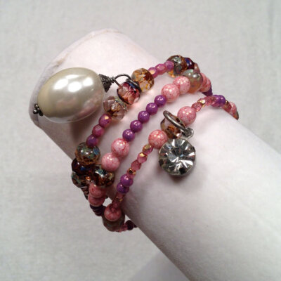 Light pink and purple beaded bracelet with pearl and diamond.