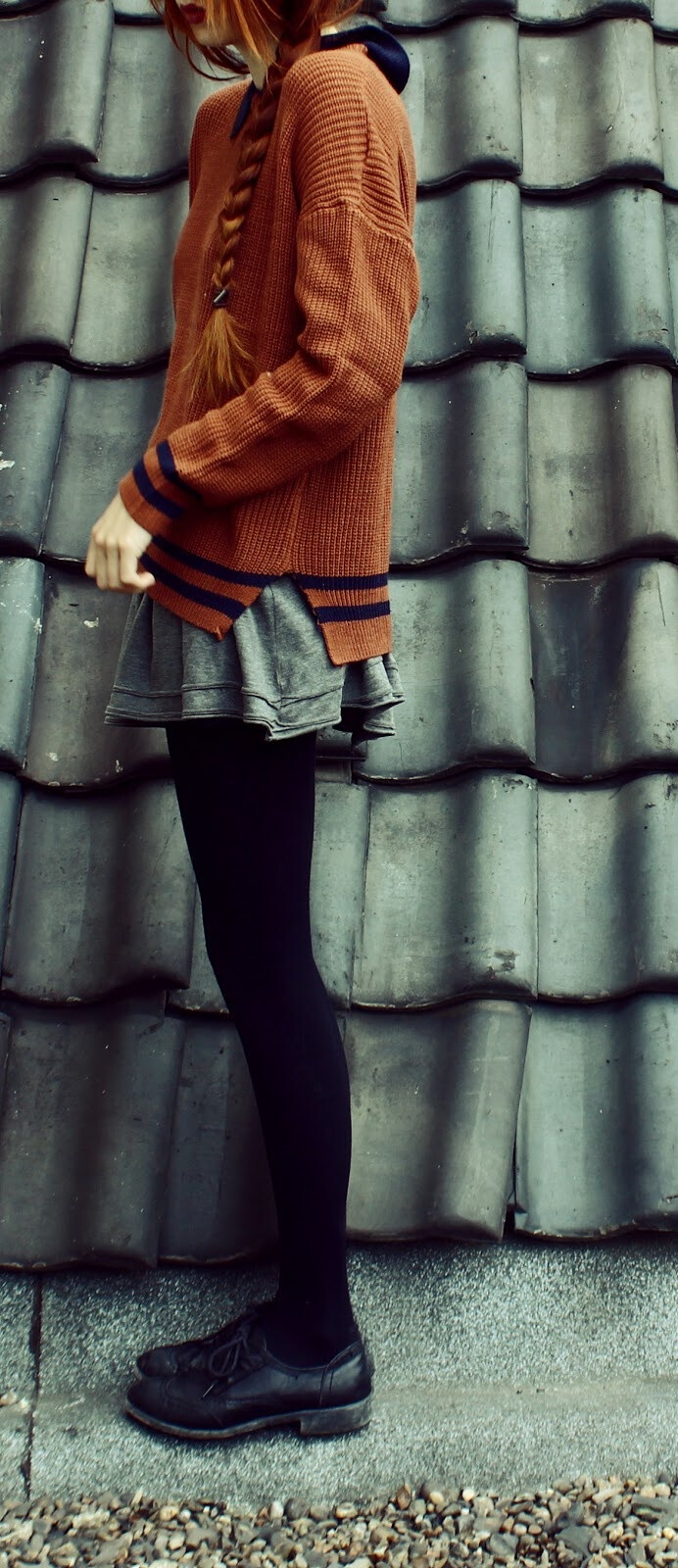 Fall outfit - Oversized persimmon /rusty colored sweater, skirt, black tights, and black shoes