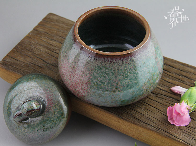 【器世界】#钧瓷茶具#工艺美术大师靳林琳作品 手工钧瓷茶罐 醒茶罐 收藏品- --钧窑瓷器历来被人们称之为“国之瑰宝”，在宋代五大名窑中以“釉具五色，艳丽绝伦”而独树一帜。由器开始，从器入茶，再从茶领悟生活美学，这就是我们的“器世界”。