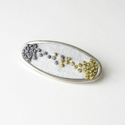 Embroidered brooch in olive and gray silk ribbon