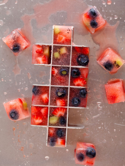 Fruit frozen into ice cubes to liven up your simple drinks.