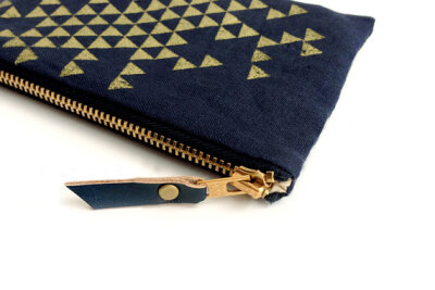 Linen navy blue zipper pouch, gold triangles, silkscreened, makeup bag