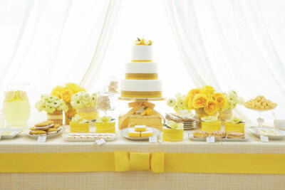 明亮活泼的黄色甜品台