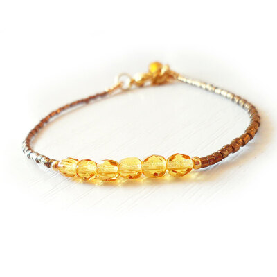 Friendship Beaded Bracelet with Faceted Topaz Beads and bronze Delica Glass Beads