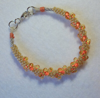 B 1129 Neon-Glo Orange Dots on Yellow Beaded Bracelet