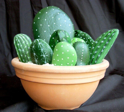 Painted Stones: Cactus. Cute for the areas that can't have actual plants or where cats would eat them. Green paint and a white sharpie?