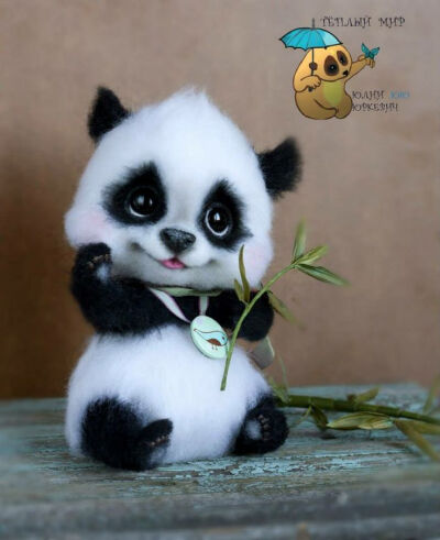 Needle felted baby panda bear by Julia yurkevich.