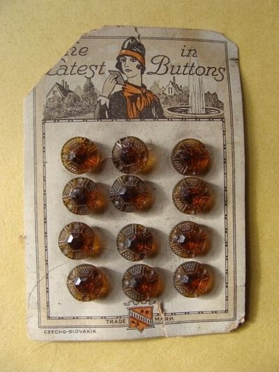 1920's root beer color glass buttons... on card