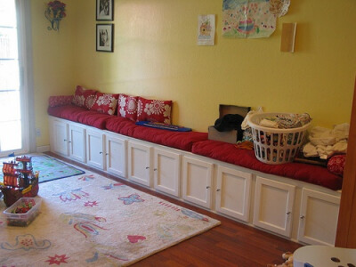 Unfinished cabinets from Lowes = bench seating &amp; storage! Play room!!