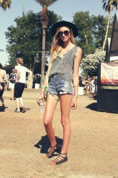 Cutoffs, stripes, hat, sandals.