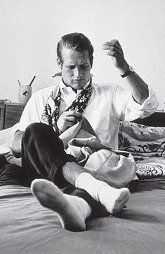 Paul Newman sewing