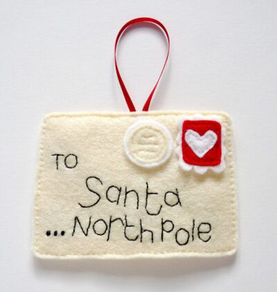 felt santa letter ornament-something like this would be cute to make with a pocket in the back to put the current Santa letter in. Then hang it on the tree or on a doorknob. One of Santa's elves can t…