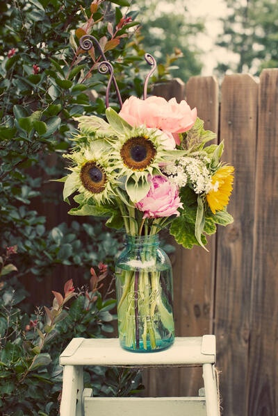 Use mason jars as flower vases at your next garden party (via @BrightNest)