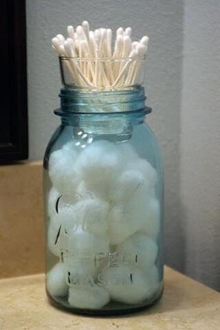 Mason jar storage idea - fill mason jar with cotton balls and use a small glass votive for q-tips #masonjar