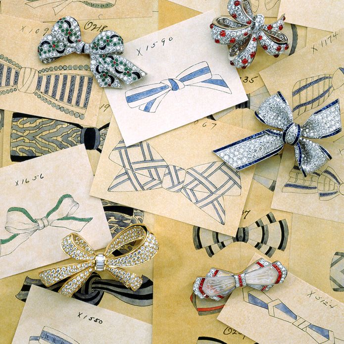 Tiffany bow brooches of diamonds on a background of drawings from the 1920s.