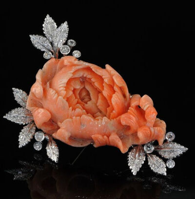 Stunning large coral rose and diamond brooch, circa 1960's.
